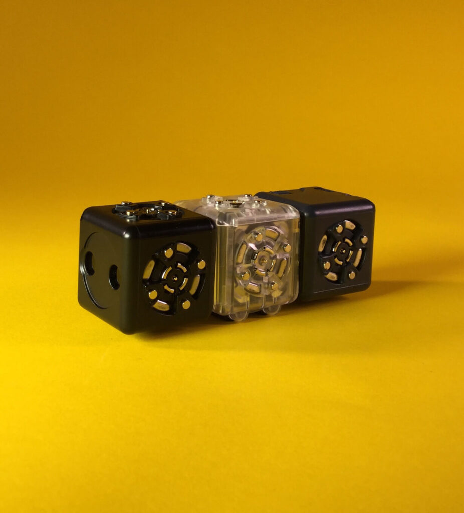 Robot with Distance Cubelet on left - Drive Cubelet in center - and Battery Cubelet on Right.